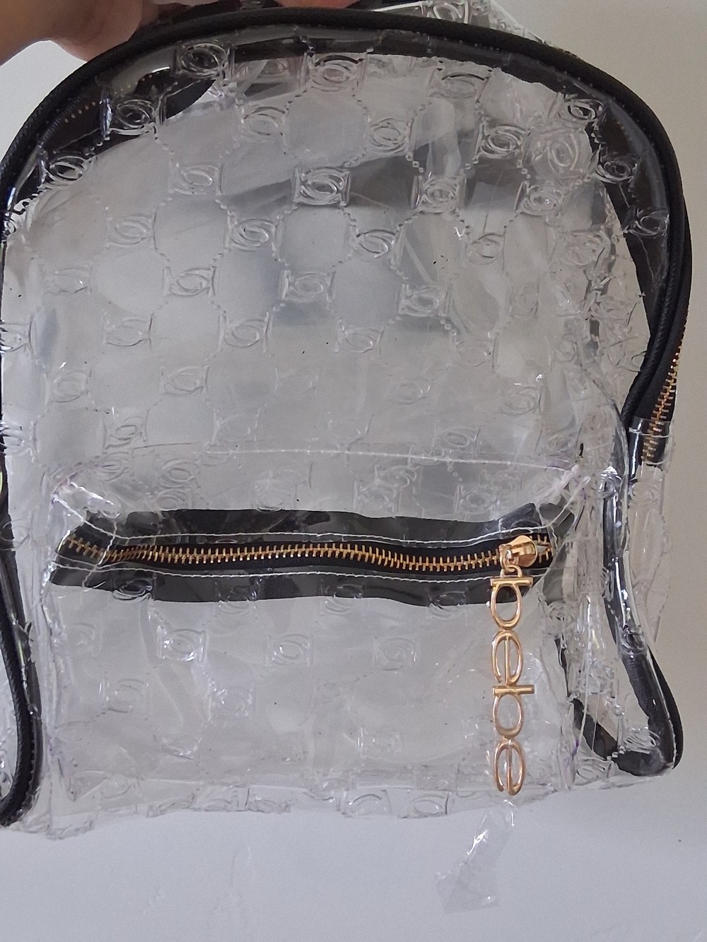 bebe Clear Backpack with Black Trim and Gold Charm